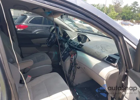 2014 Honda Odyssey Lx z USA, uszkodzony, nr VIN 5FNRL5H2XEB106627